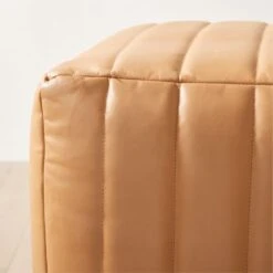 Groove Channeled Saddle Leather Pouf 7 Groove Channeled Saddle Leather Pouf -Cb2 GrooveSaddleLthrPoufAVSHS23