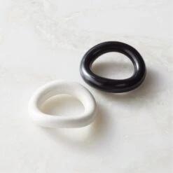 Moore Porcelain Black Napkin Rings Set Of 8 -Cb2 MooreShnyPrclnNapkinRingGrpFHF22