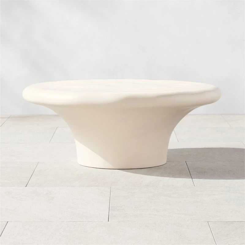 Pompeo Round Ivory Cast Resin Outdoor Coffee Table Small 1 Pompeo Round Ivory Cast Resin Outdoor Coffee Table Small