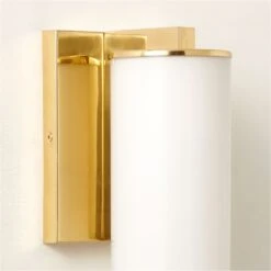 Ronda Indoor/Outdoor Polished Brass Wall Sconce 6 Ronda Indoor/Outdoor Polished Brass Wall Sconce -Cb2 RondaPldBrsInNOutdrScncAVSHF22