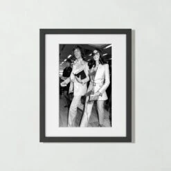 'Mick And Bianca At The London Airport, 1970' Photographic Print In Black Frame 17.5"x21.5"